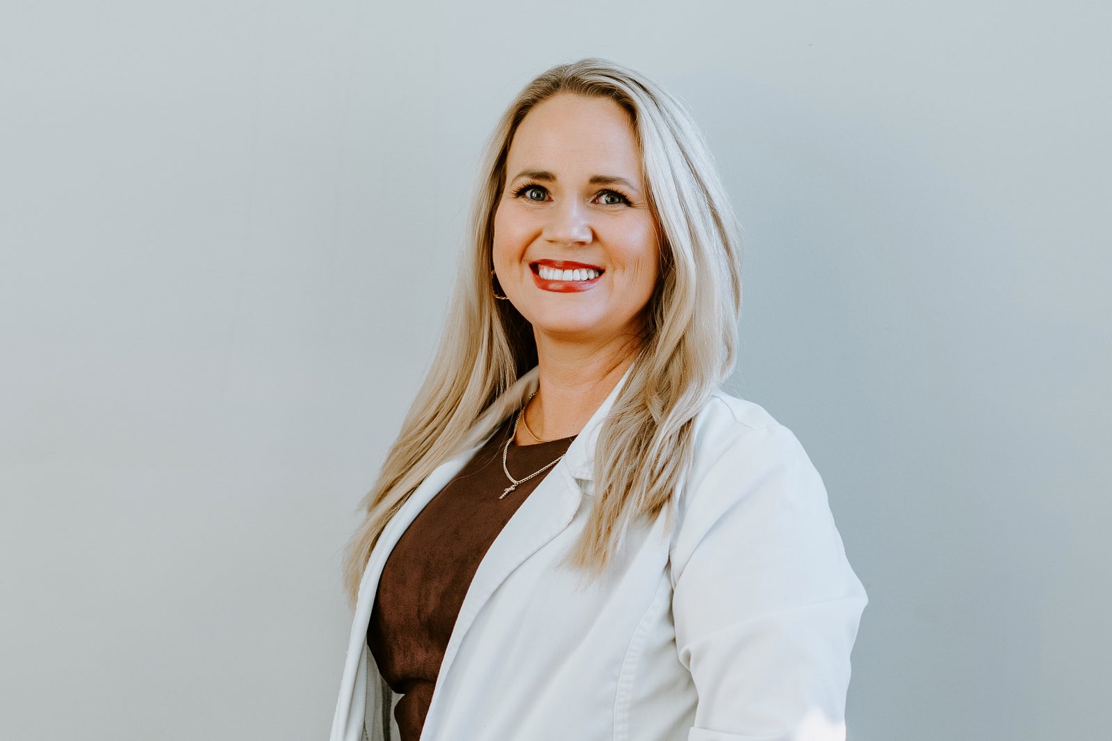 A Silique Wellness nurse practitioner in a white coat at the Lake City, FL practice